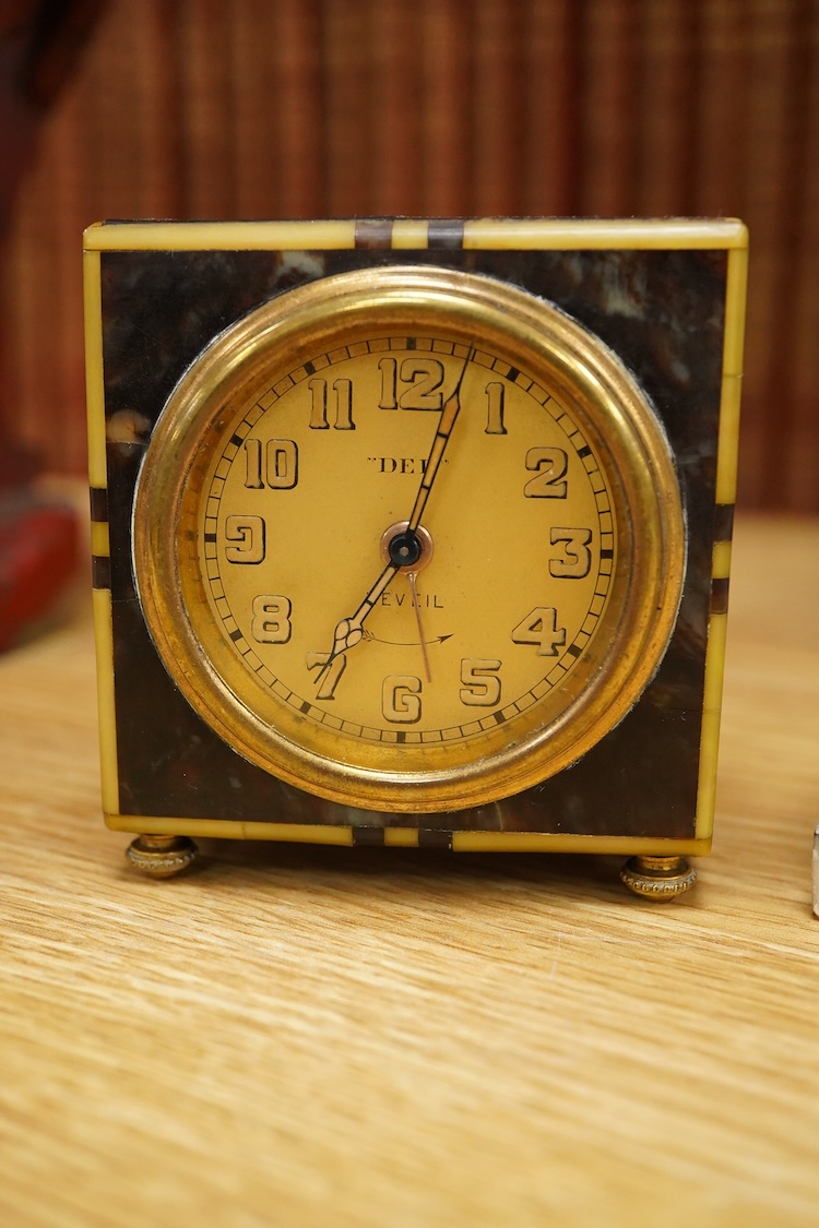 Four Art Deco timepieces, tallest 20cm